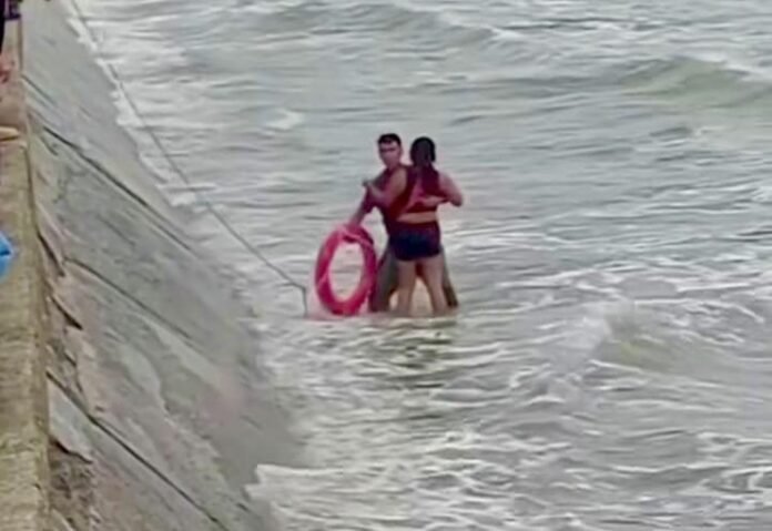 Woman Jumps into the Sea